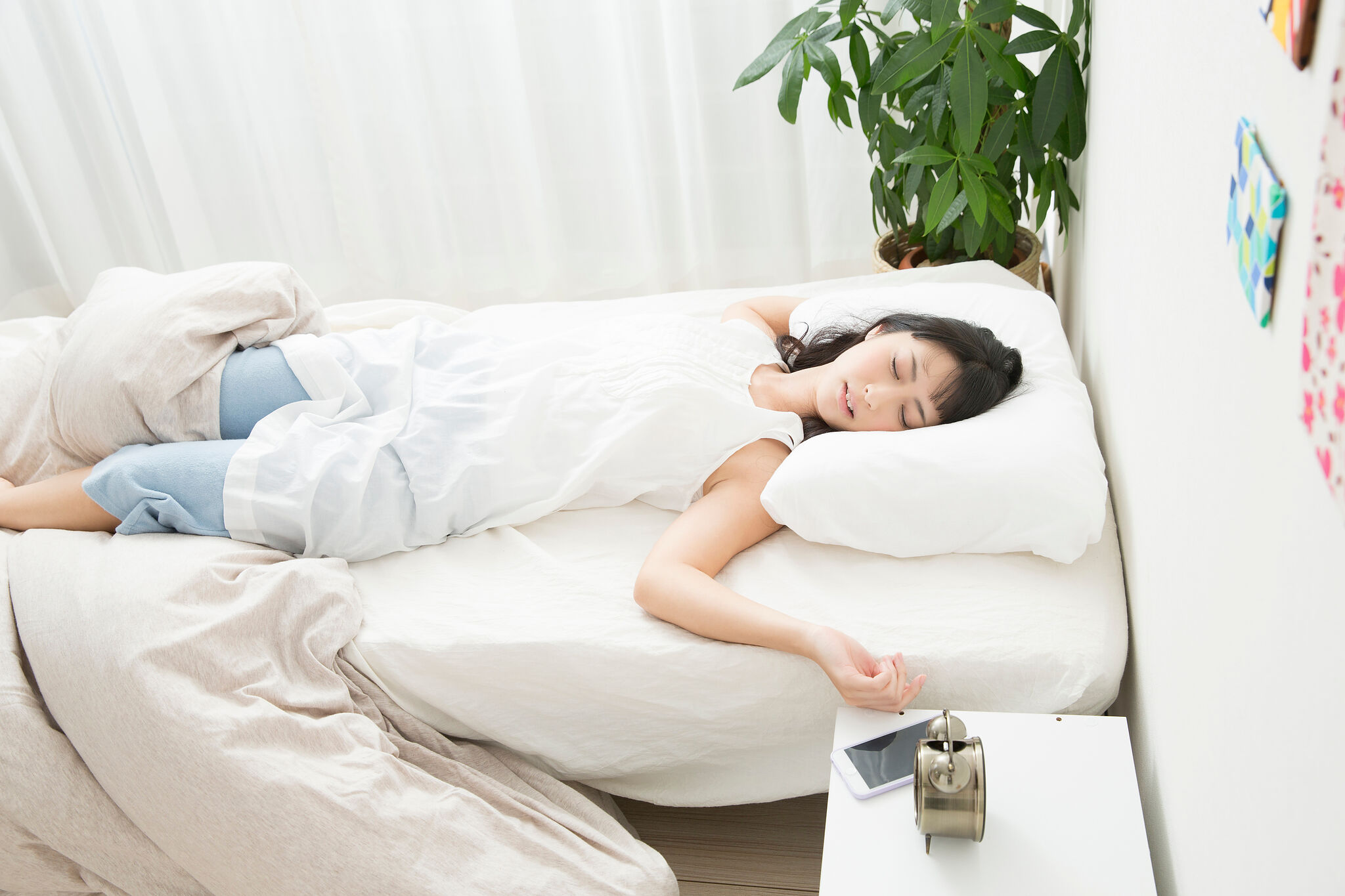 睡眠時の寝姿勢が頭痛の原因になることも